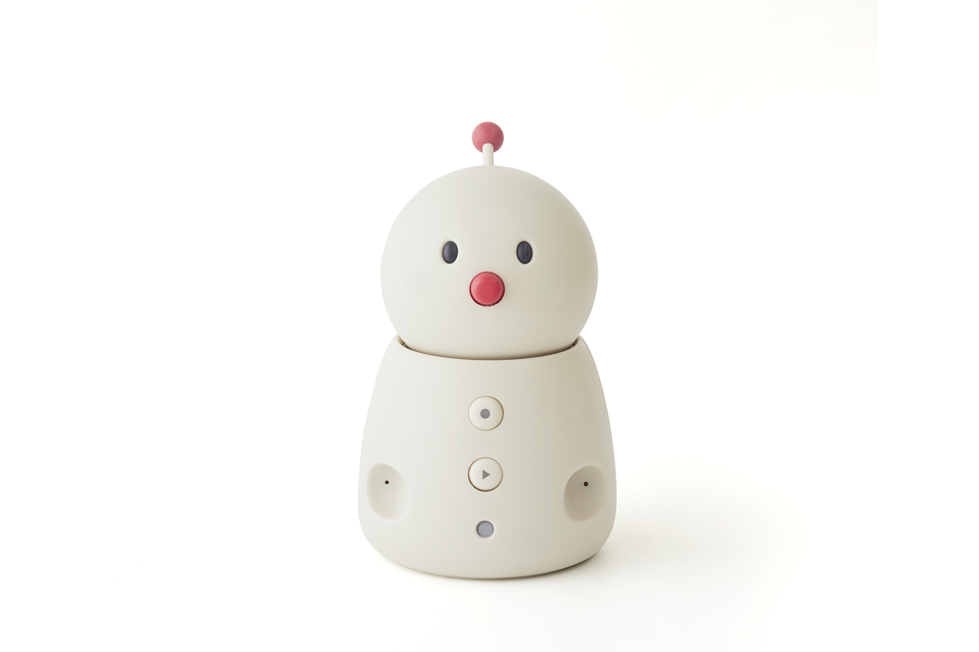BOCCO emo communication robot by Yukai Engineering in a home setting, illustrating Japanese AgeTech for senior monitoring and family connectivity.